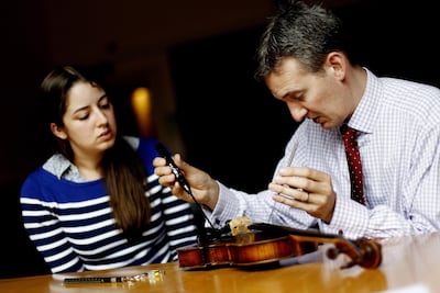 Antique violins by makers such as Antonio Stradivari, Guarneri del Gesu and Giovanni Guadagnini can sell for up to Dh125 million. Getty Images