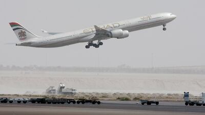 Etihad and Emirates are major parts of the global transport hub in the UAE. Andrew Parsons / The National