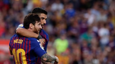 Luis Suarez scored Barcelona's late penalty after Lionel Messi handed him the spot-kick. AP Photo