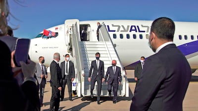 A handout picture released by the US Embassy in Morocco, shows US Presidential advisor Jared Kushner (L) and Israeli National Security Advisor Meir Ben Shabbat leaving the airplane in Morocco's capital Rabat, upon landing of the first Israel-Morocco direct commercial flight, marking the latest US-brokered diplomatic normalisation deal between the Jewish state and an Arab country. AFP
