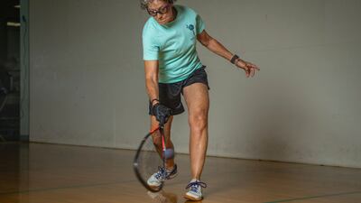 Racquetball player Nancy Fish, 72, practises for her competition.