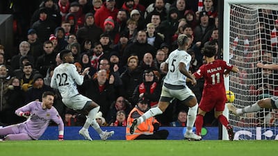 Liverpool striker Mohamed Salah scores his team's second goal. AFP