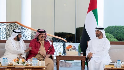Sheikh Mohamed bin Zayed, Crown Prince of Abu Dhabi and Deputy Supreme Commander of the UAE Armed Forces, right, receives King Hamad, king of Bahrain, centre, during a Sea Palace barza. Seen with Sheikh Tahnoon bin Mohamed, Ruler's Representative in Al Ain Region, left. Mohamed Al Hammadi / Ministry of Presidential Affairs