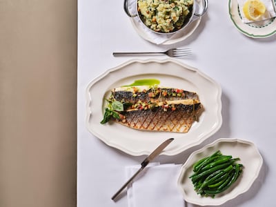 Salt-baked sea bass ($144), one of several fresh seafood options on the menu, is an excellent choice. Photo: City of Dreams Mediterranean