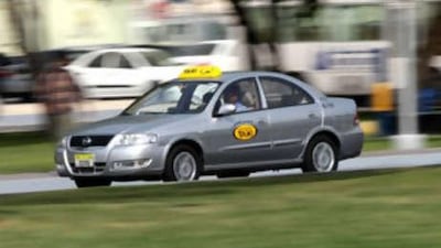 The new silver taxis operating in Abu Dhabi will be linked to a central call centre.