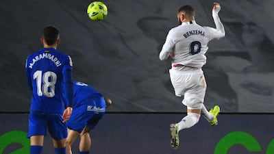 Real forward Karim Benzema scores their opening goal. AFP
