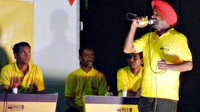 A Sikh contestant sings in a Pop Idol style contest held at labour camps across the UAE last year.