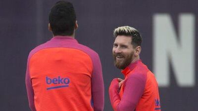 FC Barcelona’s Luis Suarez and Lionel Messi at training. Quique Garcia / EPA