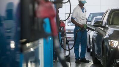 An Adnoc petrol station in Abu Dhabi. There are many methods to help make your car more fuel-efficient, from driving at a steadier pace to making sure your tyres are correctly inflated. Christopher Pike / The National
