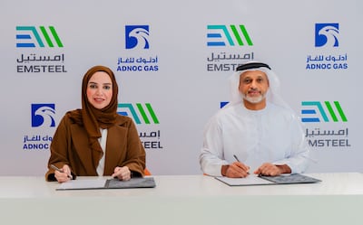 Adnoc Gas chief executive Fatema Al Nuaimi and Emsteel group chief executive Saeed Al Remeithi at the signing of the deal. Photo: Adnoc Gas
