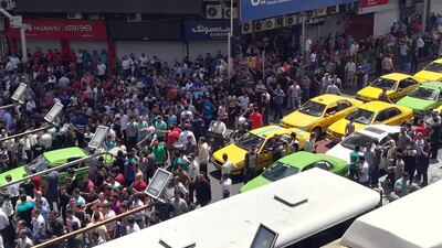 Iranian protesters shout slogans as they gather at a street close to a bazaar in Tehran, Iran, 25 June 2018. Media reported that due to a bad economic situation in Iran, Tehran's old grand bazaar was closed and people protests in the streets for the economic situations. Stringer / EPA