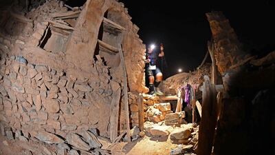 A marathon runner runs in the uninhabited village of Wadi Bani Habib in the first Oman Ultra-Trail race. AFP