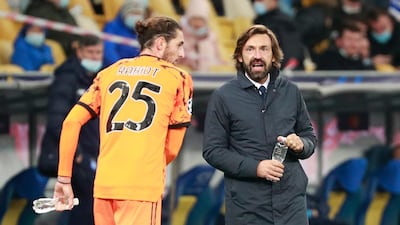 Juventus manager Andrea Pirlo gives instructions to Adrien Rabiot. AP