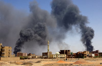 Buildings on fire after aerial bombardments in Khartoum North. Reuters