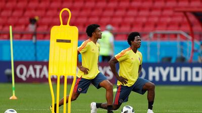 Colombia's Juan Cuadrado and Carlos Sanchez during training at the Kazan Arena on Saturday. Sanchez is suspended for the Group H match against Poland following a red card against Japan in Colombia's opening 2-1 defeat at the World Cup. John Sibley / Reuters