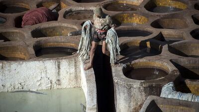 A man works in the tannery in the 9th century walled medina in the ancient Moroccan city of Fez on April 11, 2019. AFP