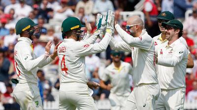 Australia wicket keeper Alex Carey celebrates with Nathan Lyon after the stumping for England opener Zak Crawley for 48. AFP