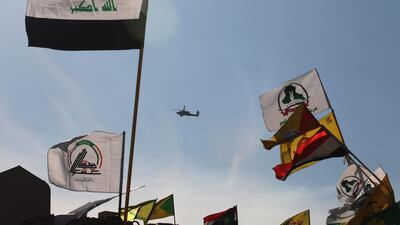 An Apache military helicopter flies over the US embassy. AFP