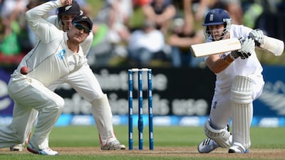 England's Steven Finn knocks past New Zealand captain Brendon McCullum.