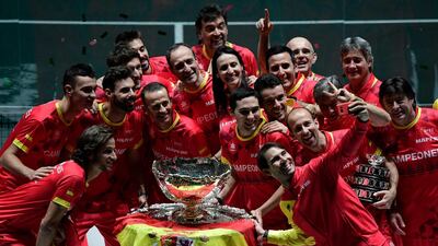 The Spanish team celebrate after beating Canada in the Davis Cup final. AFP