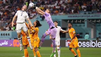 Walker Zimmerman of United States goes for a header with Andries Noppert of Netherlands during the FIFA World Cup Qatar 2022 Round of 16 match between Netherlands and USA at Khalifa International Stadium. Getty Images