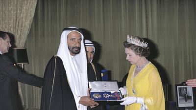 Queen Elizabeth ll inaugurates the tower in 1979 as part of her tour of the UAE. Here she is appointing Ruler of Dubai, Sheikh Rashid, a Knight Grand Cross of the Order of Saint Michael and Saint George. The British honour is conferred on people holding positions of authority. Prince Philip stands to the back left. Tim Graham / Getty Images