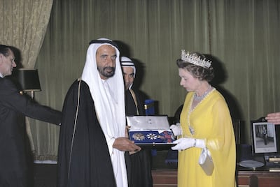 Queen Elizabeth ll inaugurates the tower in 1979 as part of her tour of the UAE. Here she is appointing Ruler of Dubai, Sheikh Rashid, a Knight Grand Cross of the Order of Saint Michael and Saint George. The British honour is conferred on people holding positions of authority. Prince Philip stands to the back left. Tim Graham / Getty Images