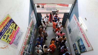 Indian voters wait in queues to cast their votes at a polling station during the sixth phase of the Indian parliamentary election in Bhopal, India. EPA