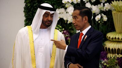 Mr Widodo talks to Sheikh Mohamed at the presidential palace in Bogor, Indonesia. Willy Kurniawan / Reuters