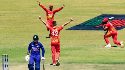 Zimbabwe's Sikandar Raza celebrates with Brad Evans after he picked up five wickets. Getty