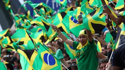 Jamaica and Brazil fans during the Group C match at Stade des Alpes in Grenoble. Brazil won the match 3-0. Reuters