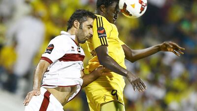 Al Wasl, in yellow, took time to find their feet but rose to the occasion in the second half after changes made by coach Hector Cuper. Hasan Alraesi / Al Ittihad