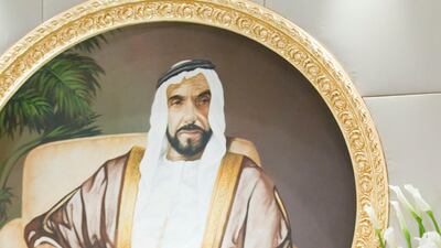 Sheikh Mohammed bin Zayed speaks with a guest while hosting a reception at Al Mushrif Palace on the occasion of Eid Al Adha.( Ryan Carter / Crown Prince Court - Abu Dhabi )