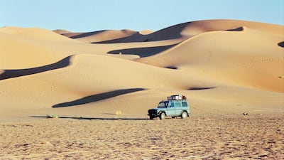Gunther Holtorf and his trusty Mercedes-Benz G-Class, which is nicknamed Otto, on their 899,592-kilometre round-the-globe trip in Libya. Courtesy Gunther Holtorf