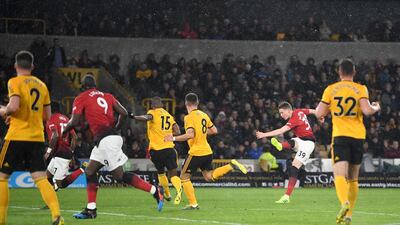 WManchester United's Scott McTominay scores his team's first goal. Getty Images