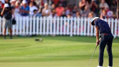 Thorbjorn Olesen putts for victory on the 18th green. Getty Images