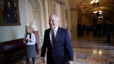 Mondale walks outside the US Senate chamber in the Capitol. AFP/Getty Images