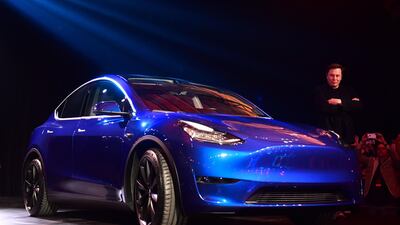 Mr. Musk unveils the new Tesla Model Y. AFP