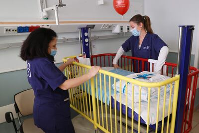 Staff at Sheba Medical Centre prepare rooms in the dedicated children's Covid-19 ward. AFP