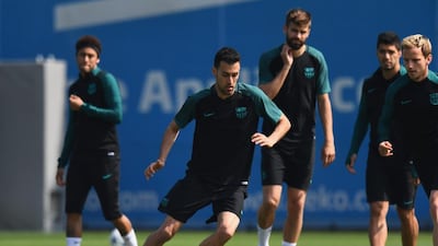 Sergio Busquetstakes part in a drill. David Ramos / Getty Images