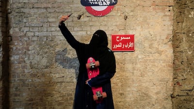 An Egyptian woman wearing the niqab at a skateboarding event in Cairo, in 2021. A ban on the veil in Egyptian schools is proving controversial. Reuters