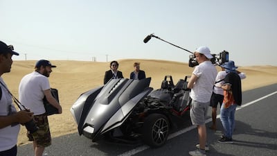 Ricky Wilson tours Abu Dhabi in a slingshot. Courtesy Etihad Airways