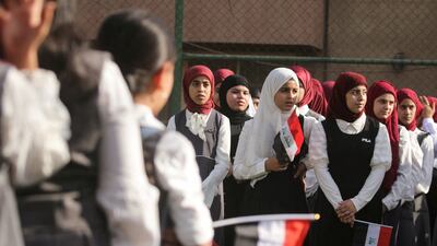 Iraqi primary school pupils attend the first day of the new academic year in Baghdad. Reuters