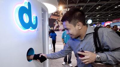 Du has been seeking wider access to its rival Etisalat's network. Jaime Puebla / The National