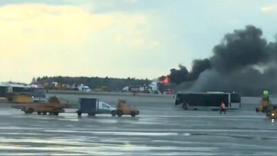 Smoke billows from the Sukhoi passenger plane.