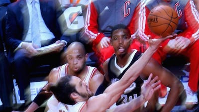 Joakim Noah of the Chicago Bulls puts up a shot at the United Center in Chicago. Jonathan Daniel / AFP / March 15, 2014.