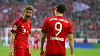 Thomas Mueller, left, and Robert Lewandowski of Bayern Munich are all smiles after demolishing Borussia Dortmund. Getty Images