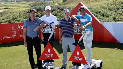 World No 3 Rory McIlroy, centre left, world No 1 Jordan Spieth, centre right, and world No 5 Rickie Fowler, right have been grouped together and will tee off on Thursday at 7.40am. Ross Kinnaird / Getty Images