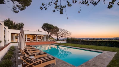 The large swimming pool at the back of the house ensures complete privacy.