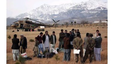 Pakistani tribesmen wait to board an army helicopter this week in Parachinar in Kurram agency, Pakistan's tribal region. A major road in the area was blocked in 2007 as part of tribal and sectarian violence that has killed more than 3,000 people.